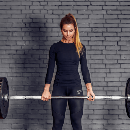 women lift the bar-arnold gym