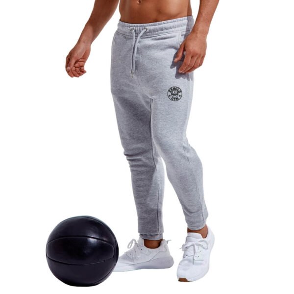 Men's Heritage Training Joggers in grey featuring Arnold Gym logo and slim fit design