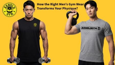 Two muscular men demonstrating how the right men's gym wear transforms your physique, wearing an Arnold Gym black sleeveless shirt and a grey muscle fit t-shirt while holding weights
